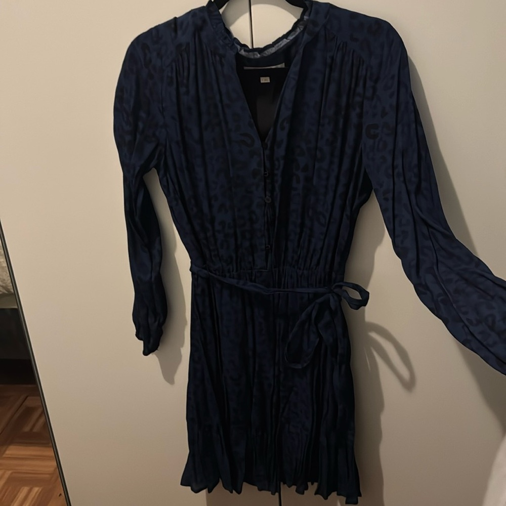 Never worn and tag is missing. Leopard print blue/black.